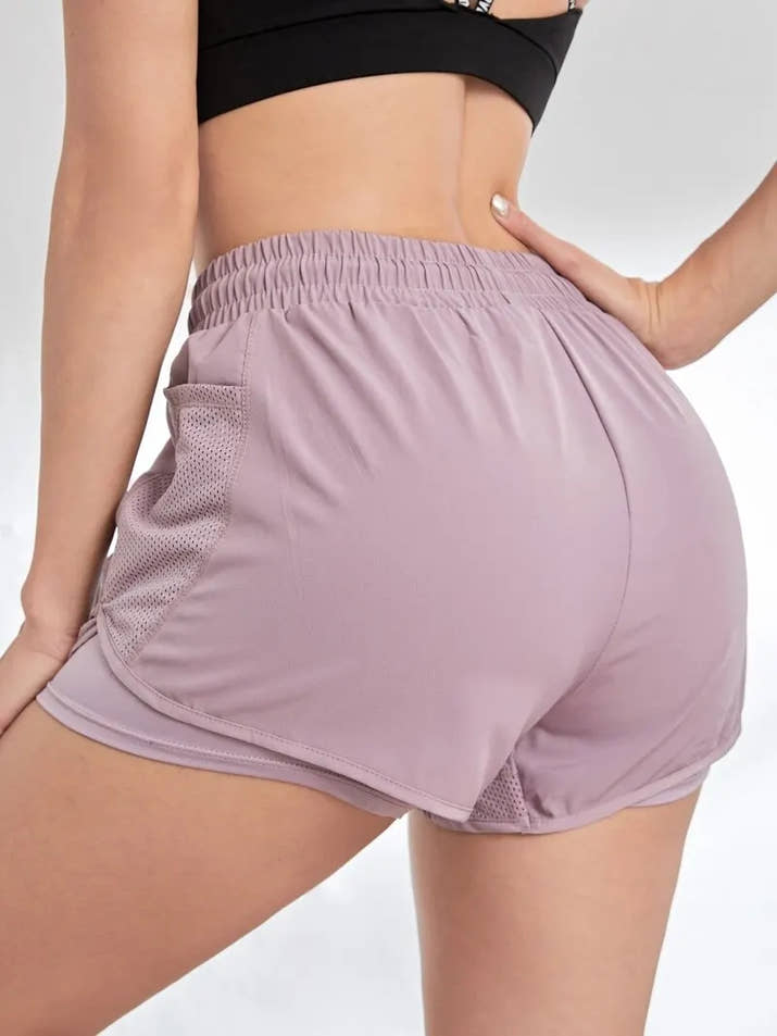 Women's Elastic Sports Shorts With Pockets