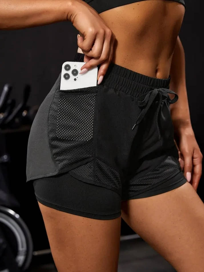Women's Elastic Sports Shorts With Pockets